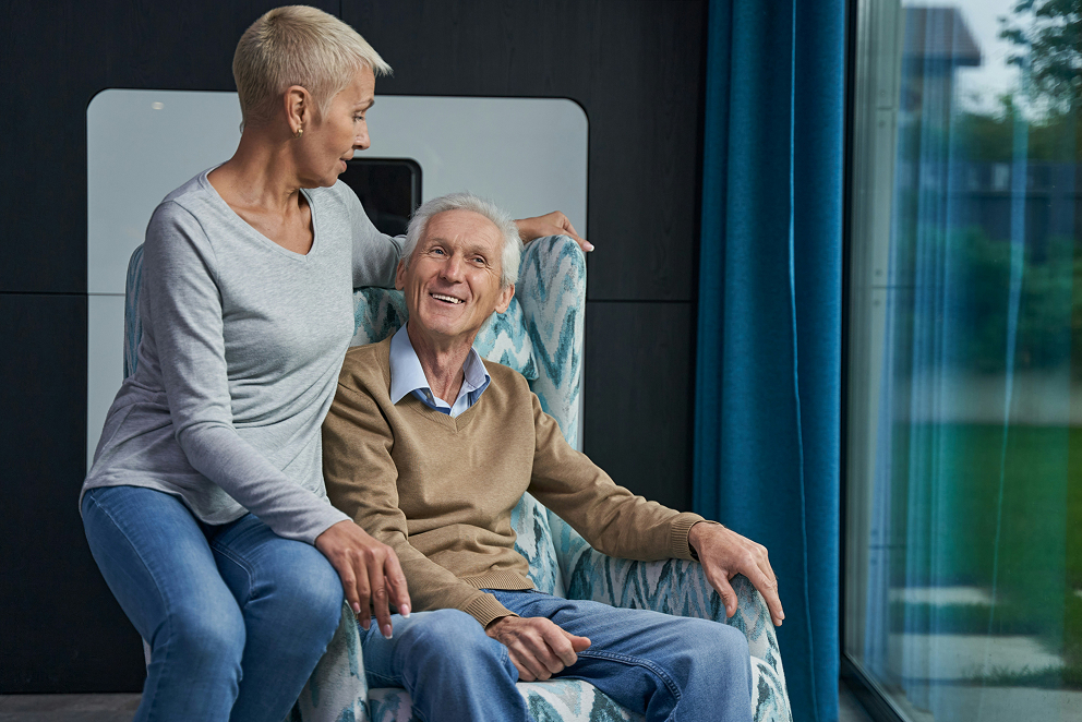 Elderly man happy with support